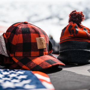 Uncharted hats sitting on a table