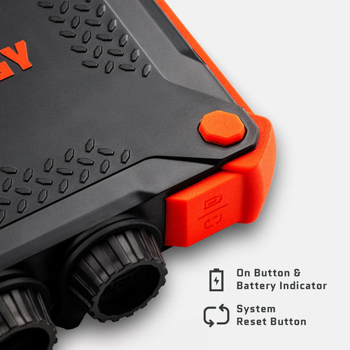 Dark Energy Poseidon XL rugged power bank, black and orange, highlighting its orange on/off button and textured surface