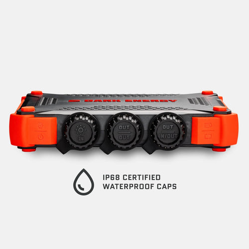 Poseidon XL waterproof power bank by Dark Energy, showing IP68 certified caps for charging in/out