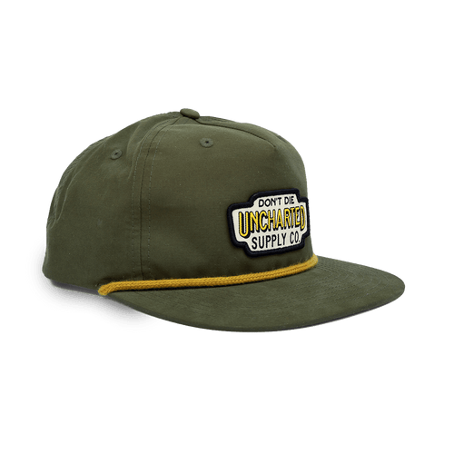 Rover Hat: Olive green flat-brim hat with gold rope and Uncharted Supply Co. 'Don't Die' patch