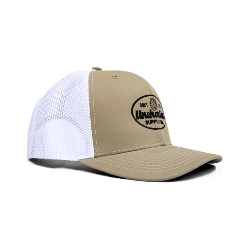 Adventure Trucker Hat, khaki front with white mesh back and black oval Uncharted Supply Co logo