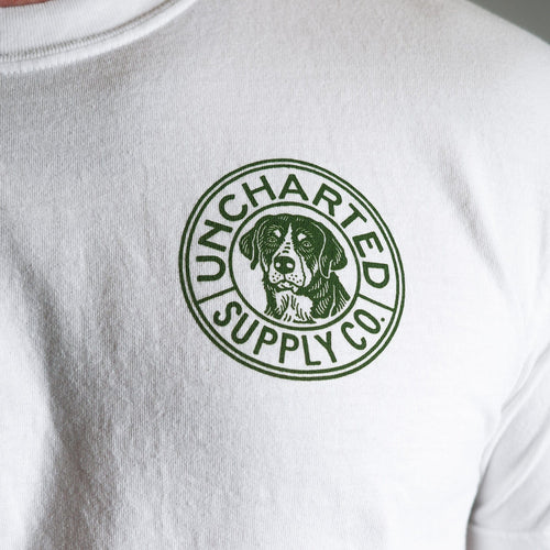 Conquer Everything T-Shirt, white with green Uncharted Supply Co dog logo for outdoor gear apparel