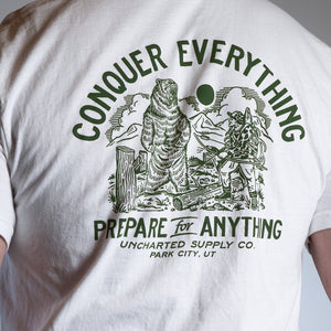 Conquer Everything T-Shirt: white back with green roaring bear, archer, and 