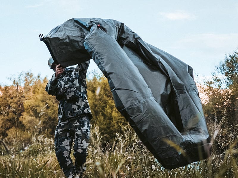 Person inflating the rapid raft