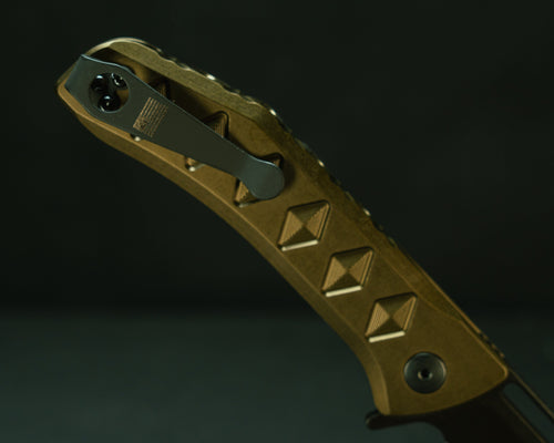 Half Face Blades Kwaiken Folder with anodized OD green handle, textured grip, and deep carry pocket clip