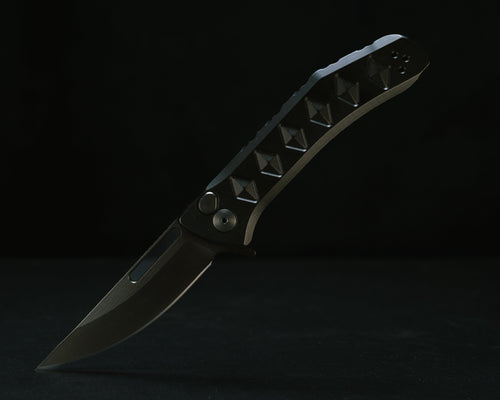 Half Face Blades Kwaiken Folder with anodized black handle, black nitride blade, and diamond textured grip