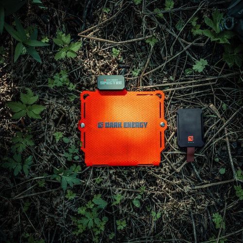 Portable solar charger: Dark Energy Spectre 8W orange panel & black power bank for emergency use