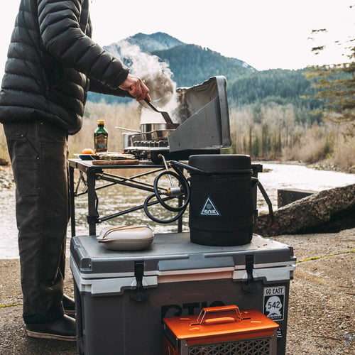 Gas Growler 3.8 Deluxe: Ignik portable propane tank powers camping stove for outdoor cooking by a river