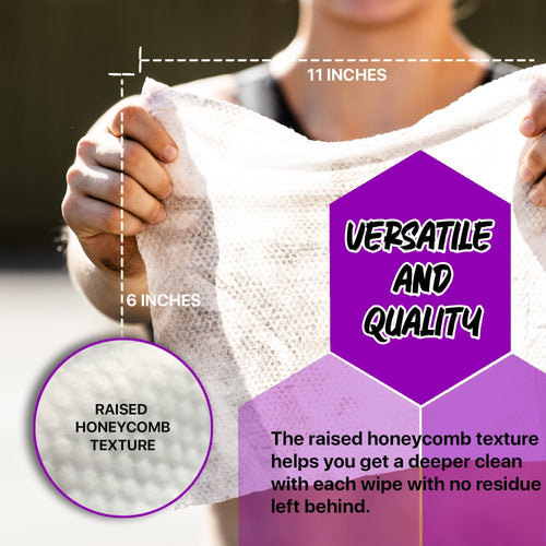 Klean Freak Body Wipes, large 11x6 inch, held by hand, showing raised honeycomb texture for a deep, residue-free clean