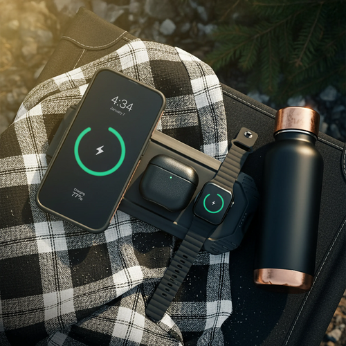Lion Eclipse Mag 3-in-1 wireless charger by Lion Energy Staging charging phone, earbuds, watch on plaid fabric outdoors