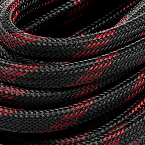 25' Solar Extension Cable by Lion Energy Staging, coiled black and red braided heavy-duty wire