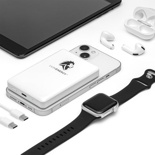 Lion Claw portable power bank by Lion Energy, white, shown with iPhone, AirPods, Apple Watch, and tablet