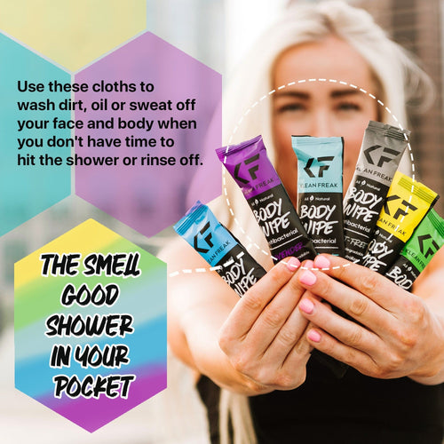 Klean Freak Body Wipes in assorted color packets held by hands, emphasizing antibacterial cleansing on the go