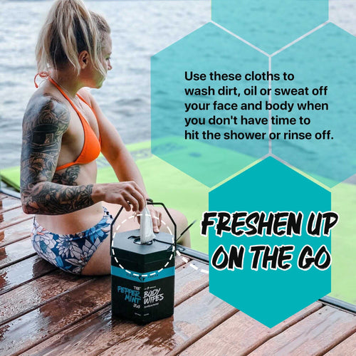 Klean Freak Body Wipes Jug, a portable black container, used by a woman on a dock for on-the-go refreshing