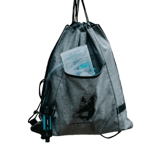 Puribag Pro Kit portable 4-in-1 water filtration system: gray drawstring bag with Puribag filter and purification pouch