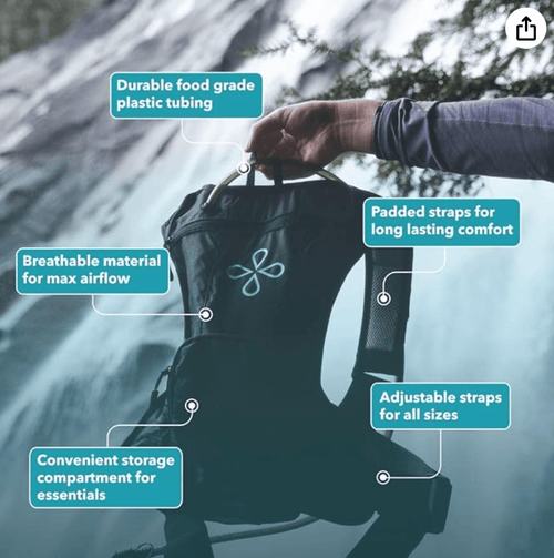 Puribag Adventure Pack, a black hydration backpack with a water filter, held outdoors in a user's hand