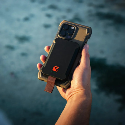 Dark Energy Poseidon Nano black magnetic rugged portable charger attached to phone case