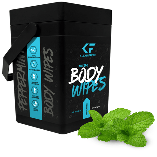 Klean Freak Peppermint Body Wipes in a black tub, 120 biodegradable wipes, with fresh mint leaves