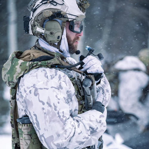 SWIG RIG - WIDE MOUTH by Hardside Hydration, in use by a soldier in winter camo, tactical hydration system with blue lighted valve