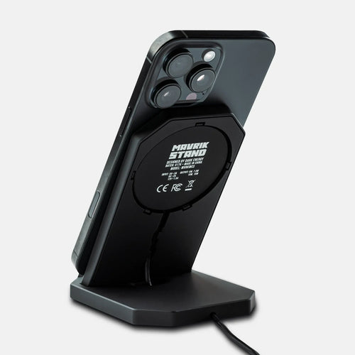 Mavrik Stand wireless charger: black iPhone 15 Pro Max held magnetically on a Dark Energy phone stand