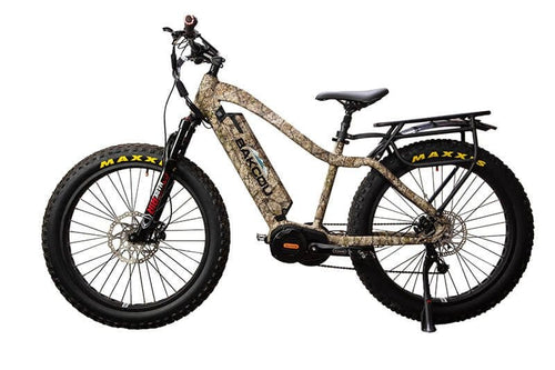 Bakcou Mule all-terrain electric bike with camouflage frame, fat tires, and rear rack