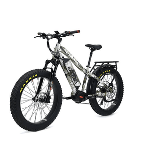 Bakcou Mule fat tire electric bike with digital camo frame, large Maxxis tires, and rear cargo rack