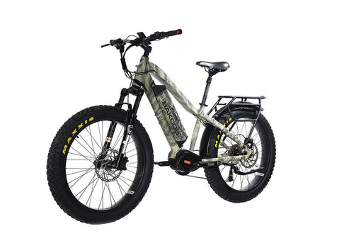 Bakcou Mule electric fat tire bike in camouflage, features rugged Maxxis tires and a rear cargo rack