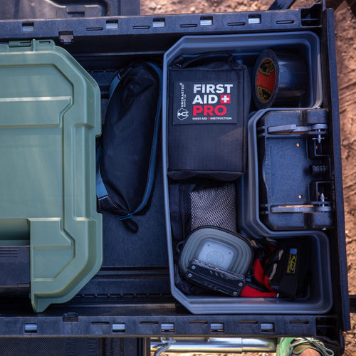 open tool box from truck with first aid pro in the back