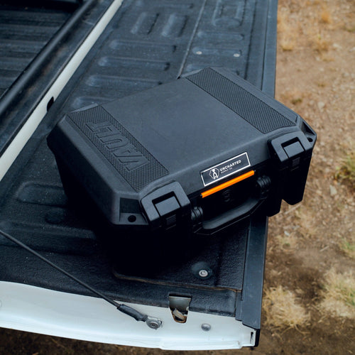 roadster case sitting on the back of a tailgate