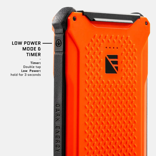 Poseidon Pro rugged power bank by Dark Energy, orange with black grip, highlighting low power mode and timer button