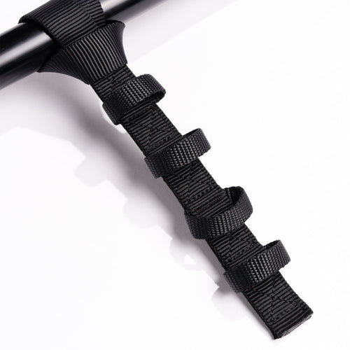 Rasant T^Pull Straps: black tactical nylon strap with attachment loops on a pole