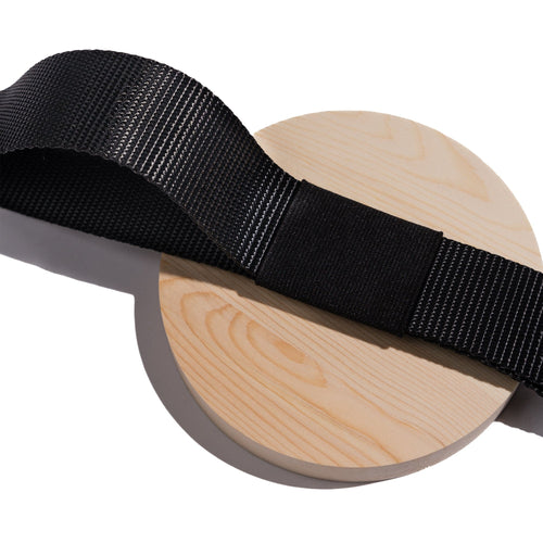 T^Pull Straps by Rasant Straps, a black textured webbing looped over a light wooden disc, heavy-duty grip straps