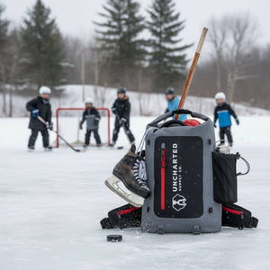 Kids play pond hockey in the background while our seventy2 shell sits in the foreground packed with hockey gear