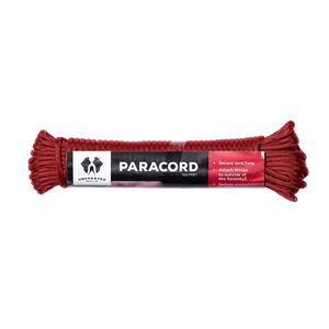 Red Uncharted Supply Co 100ft paracord survival rope with label detailing uses