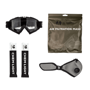 Air + Vision Refill: black tactical goggles, Uncharted Supply air filtration mask, and two chem lights