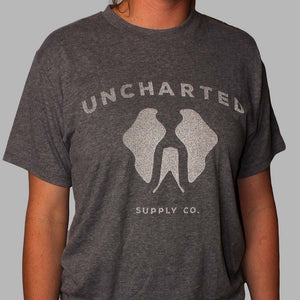 Grey Uncharted Supply Co. Logo T-Shirt, featuring 'UNCHARTED' text and mountain graphic