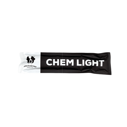 Emergency Chem Light in black & white Uncharted Supply Co. branded packaging, tactical survival light