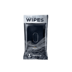 Antibacterial Wipes by Uncharted Supply Co, black packet with white topographic map design and an open tab