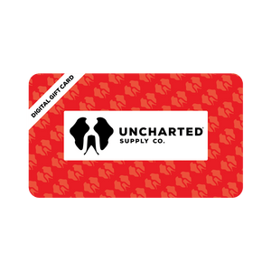 E-Gift Card for Uncharted Supply Co, red card with teeth pattern and brand logo